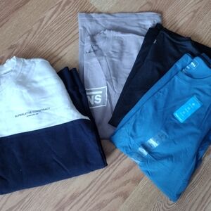 Lot Assorted Boys T-Shirts in Blue, Black, Purple, and White/Navy Sweatshirt